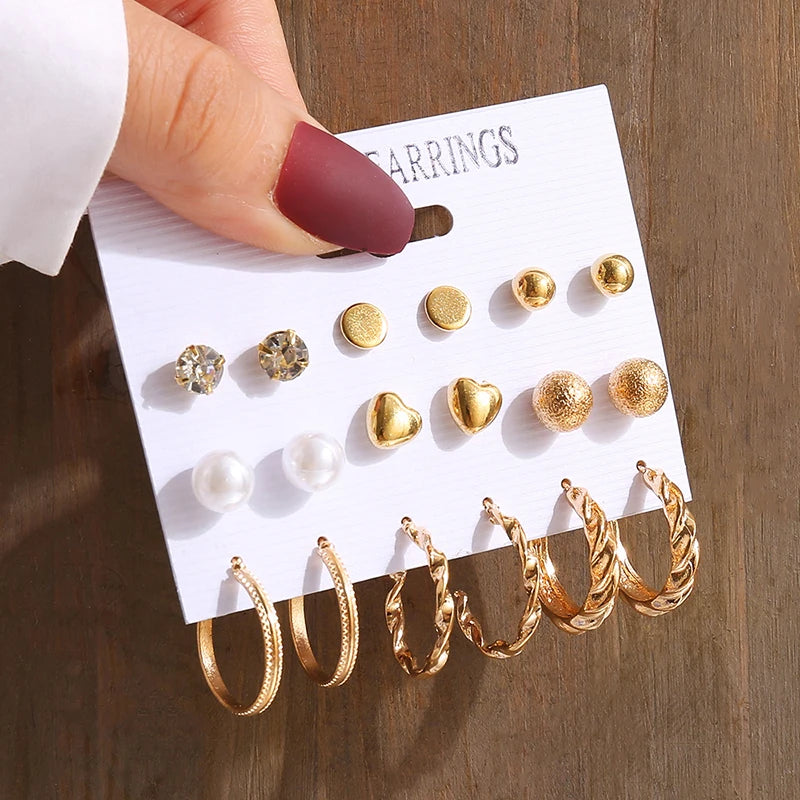 Elegant Gold-Tone Earrings Set with Pearls