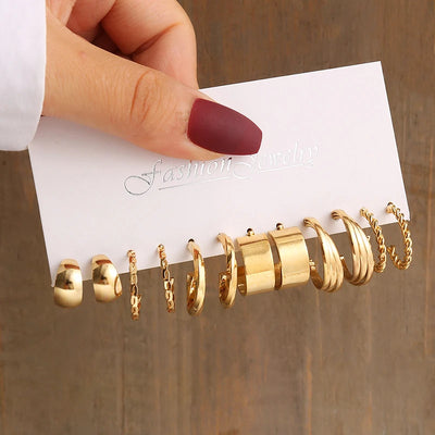 Elegant Gold-Tone Earrings Set with Pearls