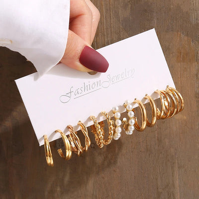 Elegant Gold-Tone Earrings Set with Pearls