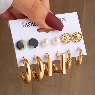 Elegant Gold-Tone Earrings Set with Pearls