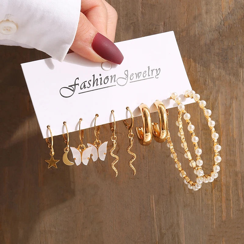 Elegant Gold-Tone Earrings Set with Pearls
