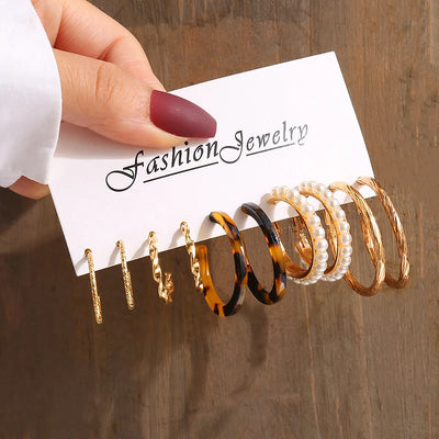 Elegant Gold-Tone Earrings Set with Pearls