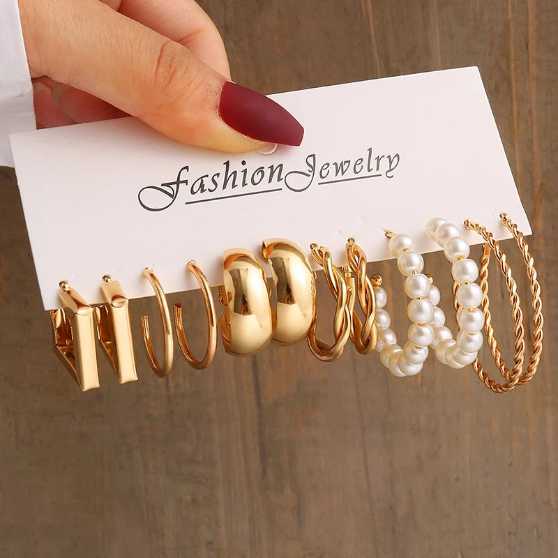 Elegant Gold-Tone Earrings Set with Pearls