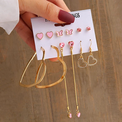 Elegant Gold-Tone Earrings Set with Pearls