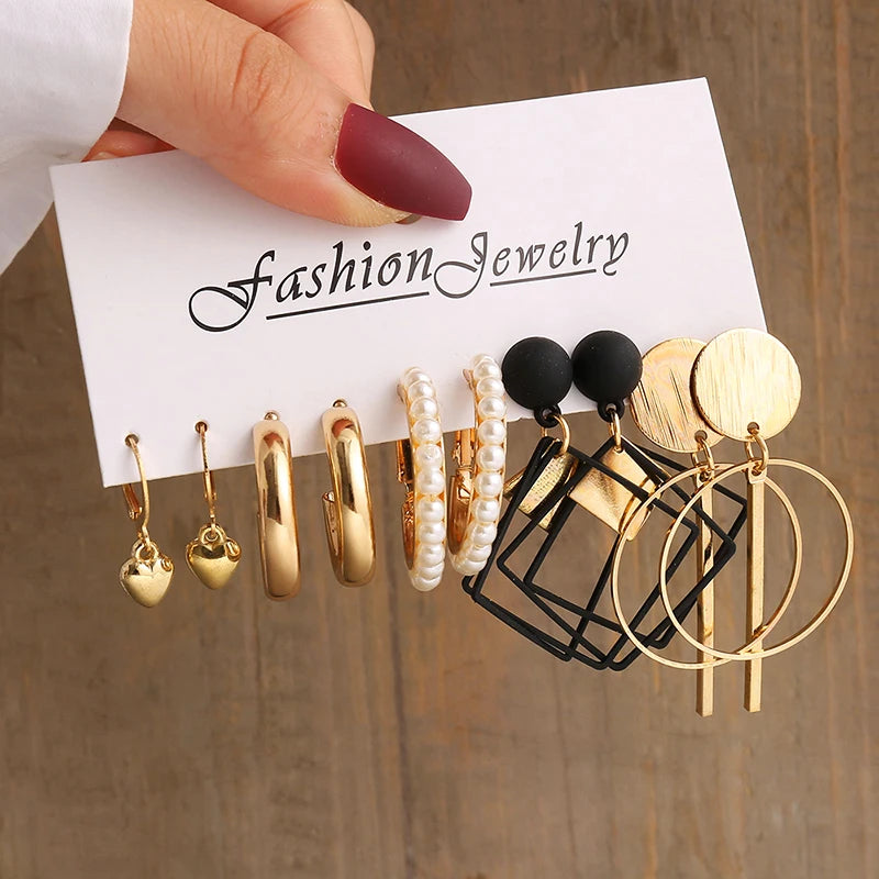 Elegant Gold-Tone Earrings Set with Pearls