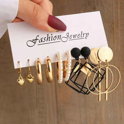 Elegant Gold-Tone Earrings Set with Pearls