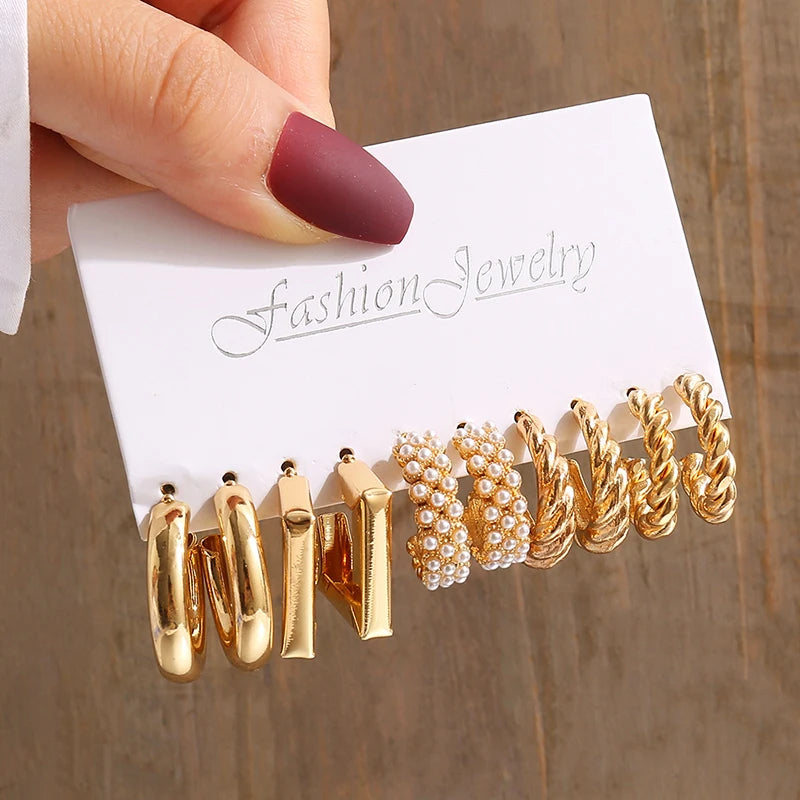 Elegant Gold-Tone Earrings Set with Pearls